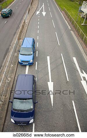 Stock Image - Cars on road. Fotosearch