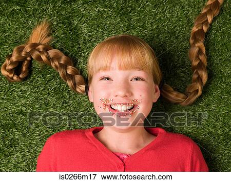 Girl with her mouth covered in sprinkles View Large Photo Image Stock Photo - Girl with her mouth covered in sprinkles. Fotosearch