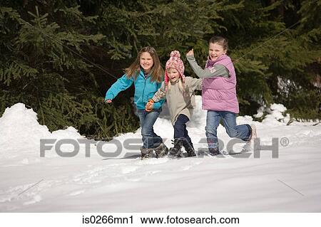 Girls in the snow View Large Photo Image Stock Image - Girls in the snow. Fotosearch