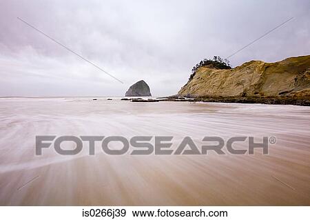 Haystack rock oregon View Large Photo Image Stock Photo - Haystack rock oregon. Fotosearch