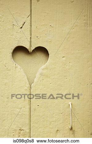 Heart shape in door View Large Photo Image Stock Photo - Heart shape in door. Fotosearch