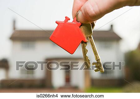 Person holding house keys View Large Photo Image Picture - Person holding house keys. Fotosearch