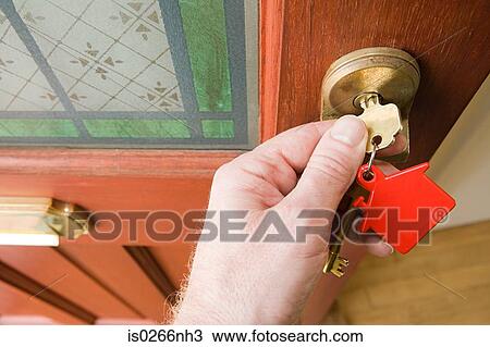 Person opening front door View Large Photo Image Stock Image - Person opening front door. Fotosearch