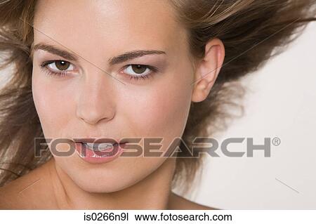 Stock Image - Portrait of a young woman. Fotosearch
