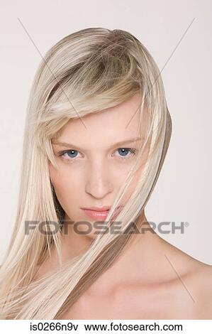 Portrait of a young woman View Large Photo Image Stock Photo - Portrait of a young woman. Fotosearch