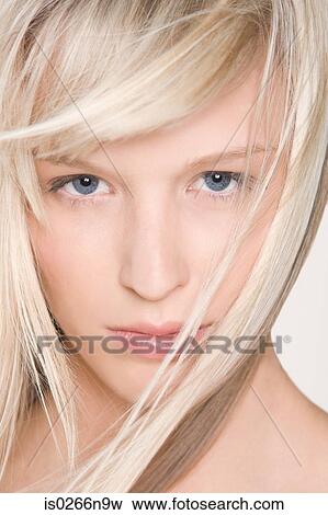 Portrait of a young woman View Large Photo Image Stock Photo - Portrait of a young woman. Fotosearch