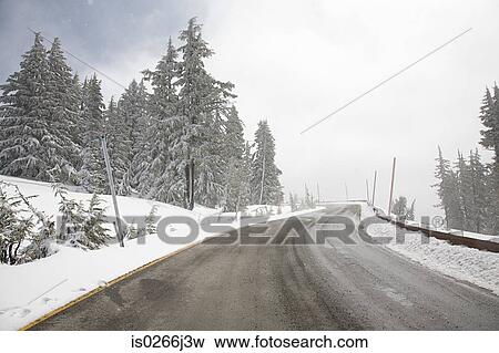 Snow along a road View Large Photo Image Stock Photo - Snow along a road. Fotosearch