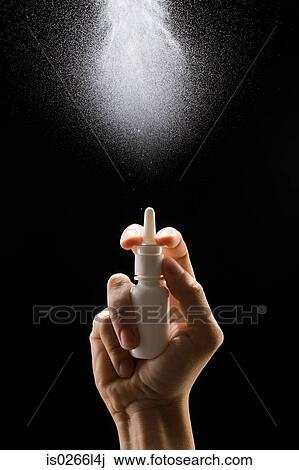 Spraying nasal spray View Large Photo Image Stock Image - Spraying nasal spray. Fotosearch