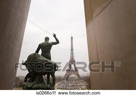 Statue and eiffel tower View Large Photo Image Stock Image - Statue and eiffel tower. Fotosearch