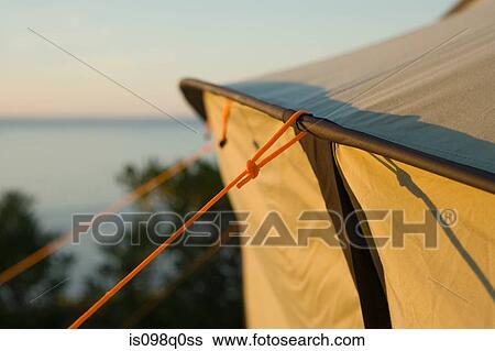 Stock Photograph - Sunlight on tent. Fotosearch
