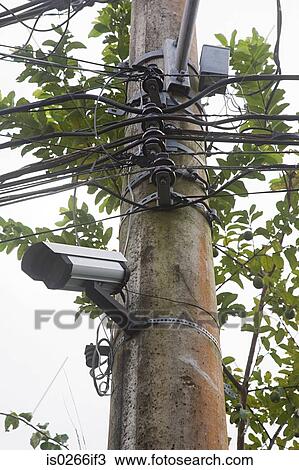 Surveillance camera on a pole View Large Photo Image Stock Image - Surveillance camera on a pole. Fotosearch