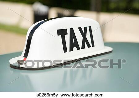 Taxi sign View Large Photo Image Stock Photo - Taxi sign. Fotosearch