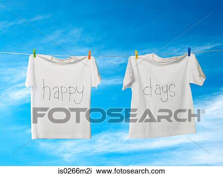 Tshirts hanging on a clothesline View Large Photo Image Stock Image - Tshirts hanging on a clothesline. Fotosearch