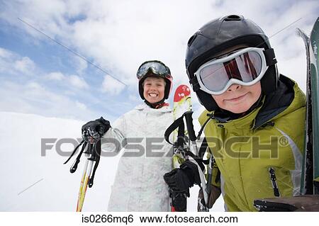 Stock Photograph - Two boys skiing. Fotosearch