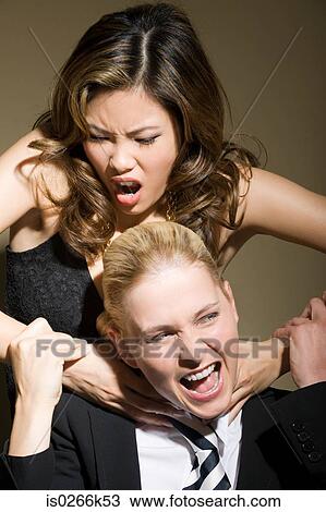 Stock Image - Two women fighting. Fotosearch