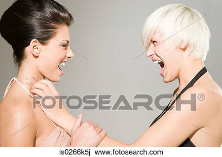 Two women fighting View Large Photo Image Stock Image - Two women fighting. Fotosearch