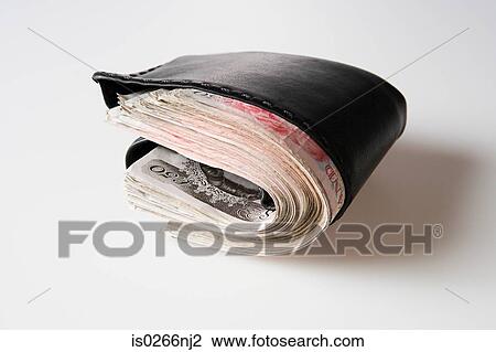 Wallet filled with banknotes View Large Photo Image Stock Image - Wallet filled with banknotes. Fotosearch