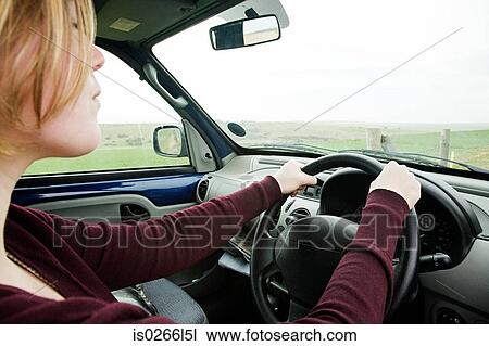 Woman driving car View Large Photo Image Stock Image - Woman driving car. Fotosearch