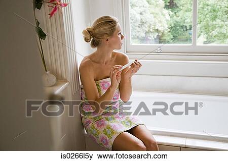 Young woman filing nails View Large Photo Image Stock Photo - Young woman filing nails. Fotosearch