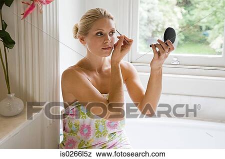 Young woman plucking eyebrows View Large Photo Image Stock Photo - Young woman plucking eyebrows. Fotosearch