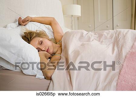 Young woman sleeping View Large Photo Image Stock Photography - Young woman sleeping. Fotosearch