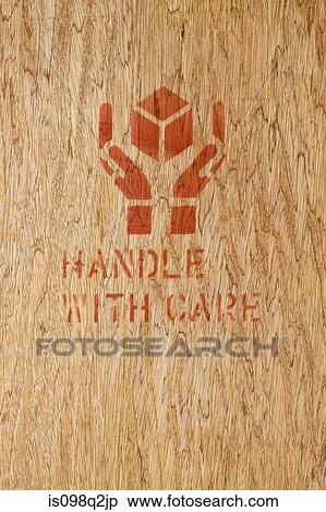 A symbol on a crate View Large Photo Image Stock Photography - A symbol on a crate. Fotosearch
