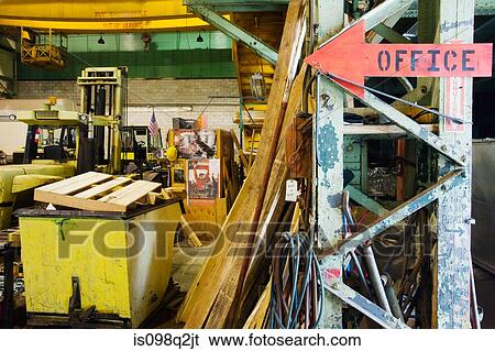 An arrow sign in a warehouse View Large Photo Image Stock Photograph - An arrow sign in a warehouse. Fotosearch