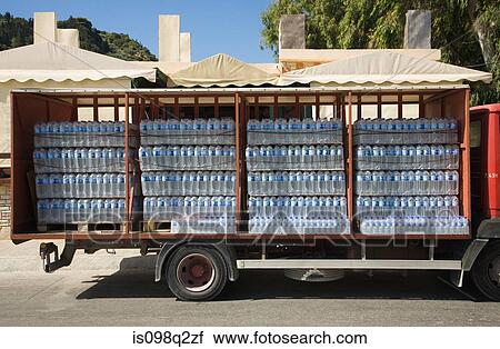 Bottles of water on a truck View Large Photo Image Stock Image - Bottles of water on a truck. Fotosearch