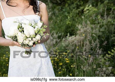 Bride outdoors View Large Photo Image Stock Image - Bride outdoors. Fotosearch