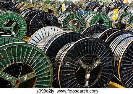 Stock Photo - Cable drums in a row. Fotosearch