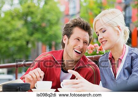 Couple at cafe View Large Photo Image Stock Image - Couple at cafe. Fotosearch
