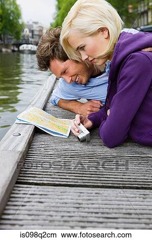 Picture - Couple by canal. Fotosearch