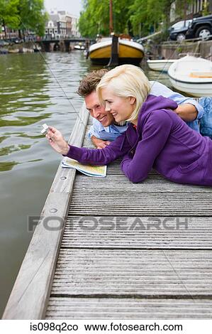 Picture - Couple by canal. Fotosearch