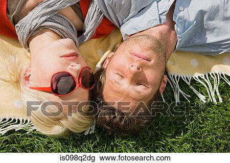 Couple in park View Large Photo Image Stock Image - Couple in park. Fotosearch