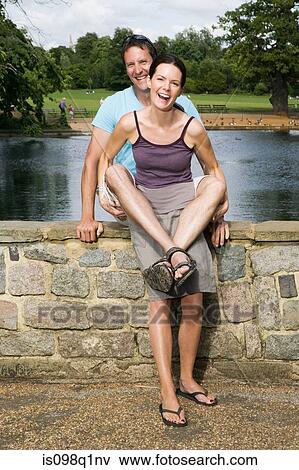 Couple in park View Large Photo Image Stock Photo - Couple in park. Fotosearch
