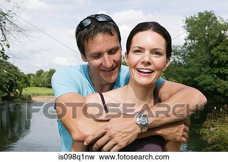 Couple in park View Large Photo Image Stock Photo - Couple in park. Fotosearch