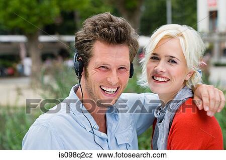 Couple with headphones View Large Photo Image Stock Photo - Couple with headphones. Fotosearch