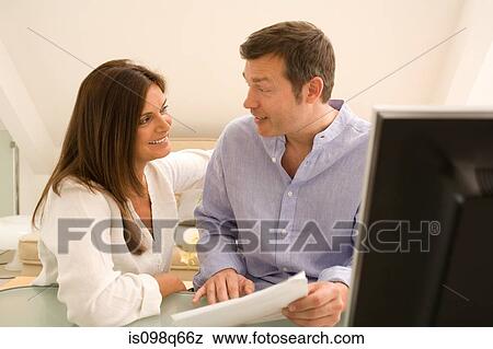 Stock Photo - Couple with letter. Fotosearch