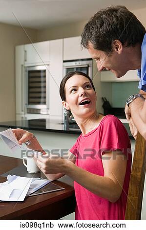 Couple with mail View Large Photo Image Stock Image - Couple with mail. Fotosearch