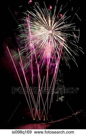 Firework display over a river View Large Photo Image Stock Photo - Firework display over a river. Fotosearch