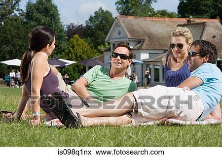 Stock Photo - Friends in park. Fotosearch