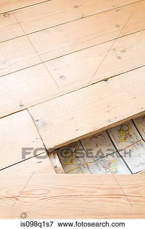 Hidden money under floorboards View Large Photo Image Stock Photo - Hidden money under floorboards. Fotosearch
