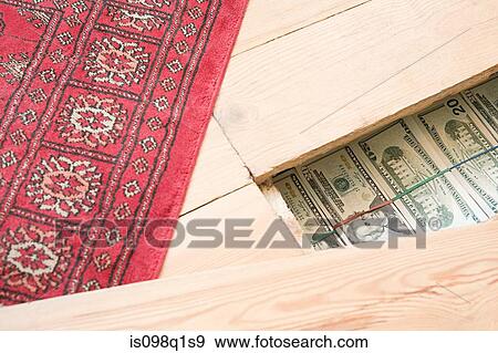 Hidden money under floorboards View Large Photo Image Stock Photo - Hidden money under floorboards. Fotosearch