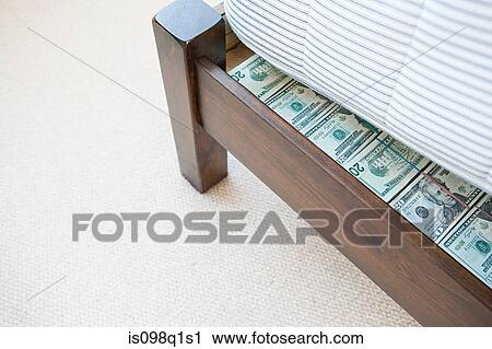 Money hidden under a mattress View Large Photo Image Stock Image - Money hidden under a mattress. Fotosearch