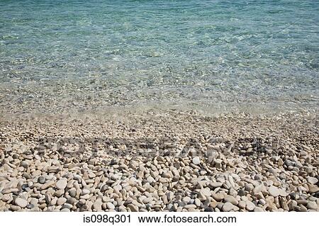 Pebble beach and sea View Large Photo Image Stock Image - Pebble beach and sea. Fotosearch