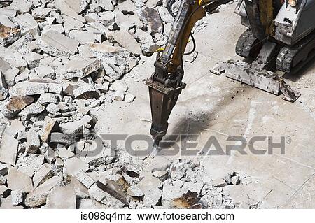 Pneumatic drill breaking concrete View Large Photo Image Stock Photo - Pneumatic drill breaking concrete. Fotosearch