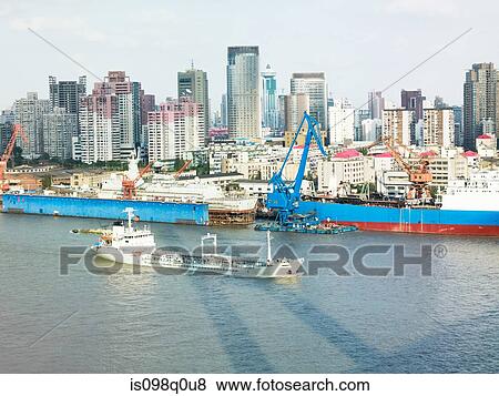 Stock Photo - Ship on river in shanghai. Fotosearch