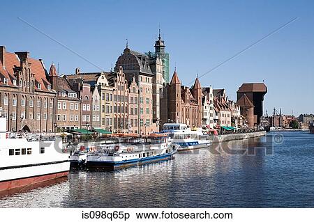 Stock Photography - Ships and buildings along motlawa. Fotosearch
