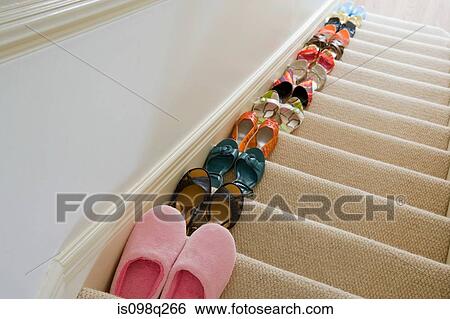 Shoes on staircase View Large Photo Image Stock Photograph - Shoes on staircase. Fotosearch