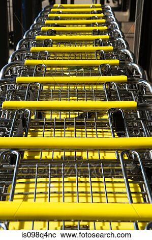 Shopping trolleys View Large Photo Image Stock Image - Shopping trolleys. Fotosearch